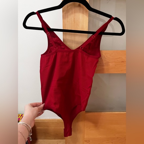 2 garage body suits one white one red want to sell together - Picture 4 of 4